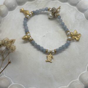 Pulsera Piedras Azules y Perlas con Dijes Elastica